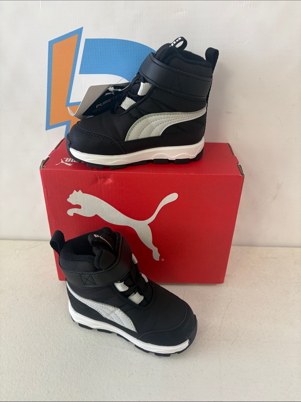 Puma Kids Black and White Mid-Top Boots